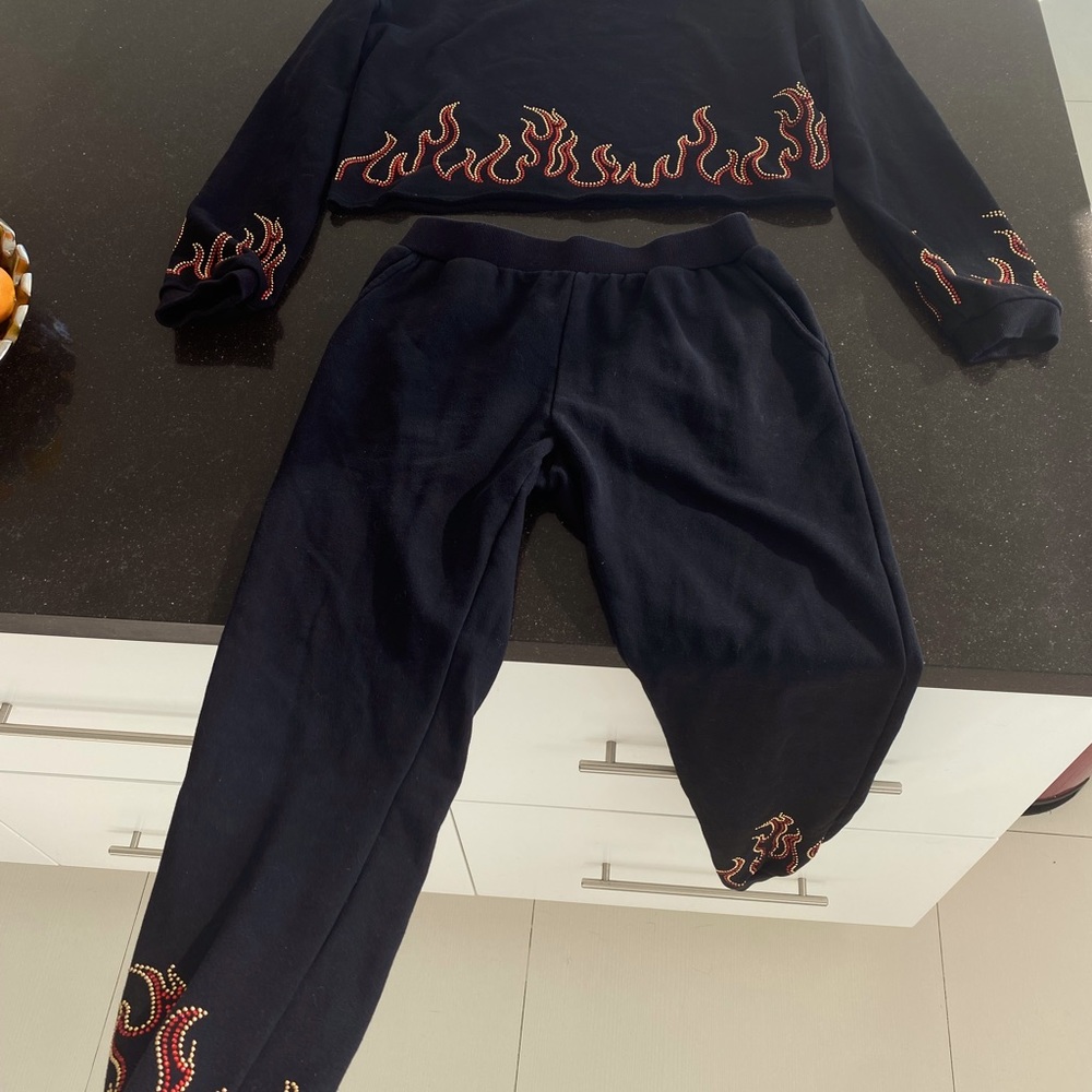 2 piece flaming sweater and pants set. ✨
